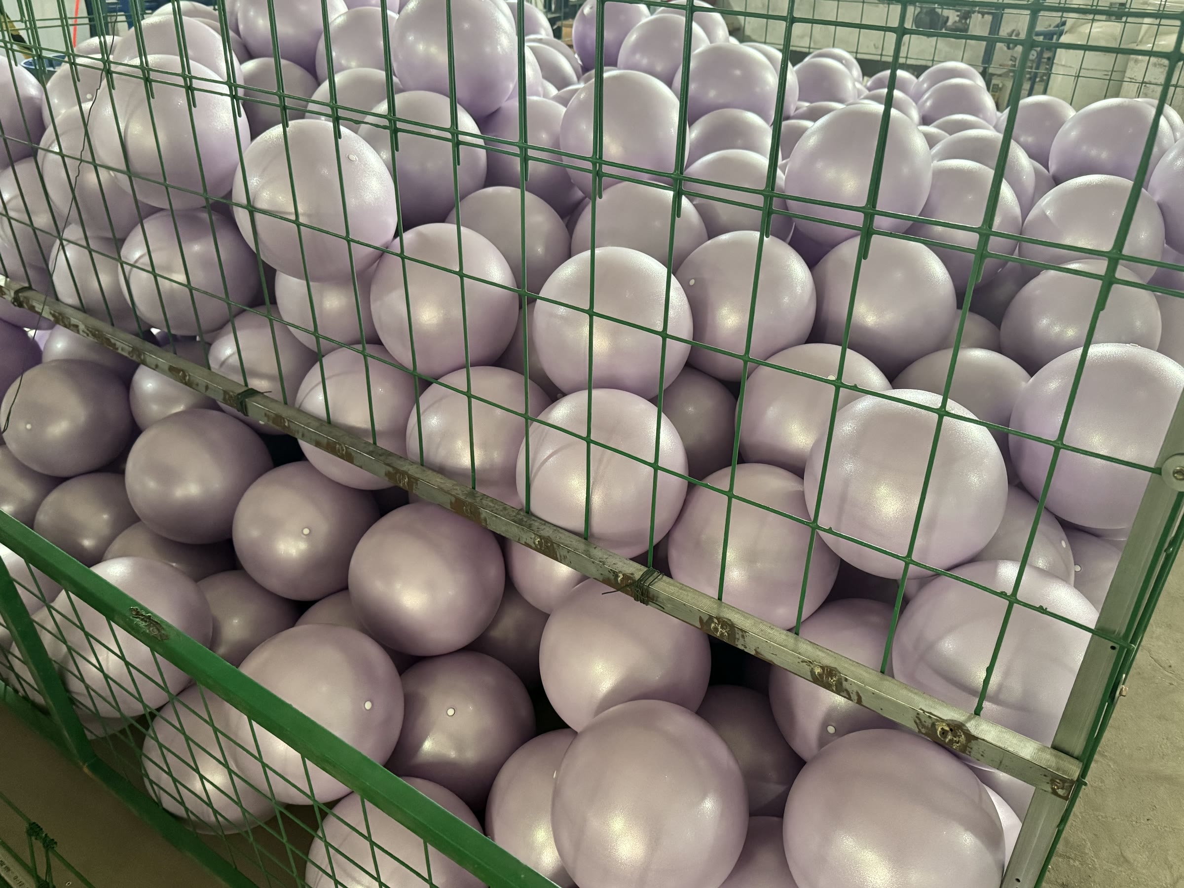 Lilac mini Pilates balls in a real WENKU production batch