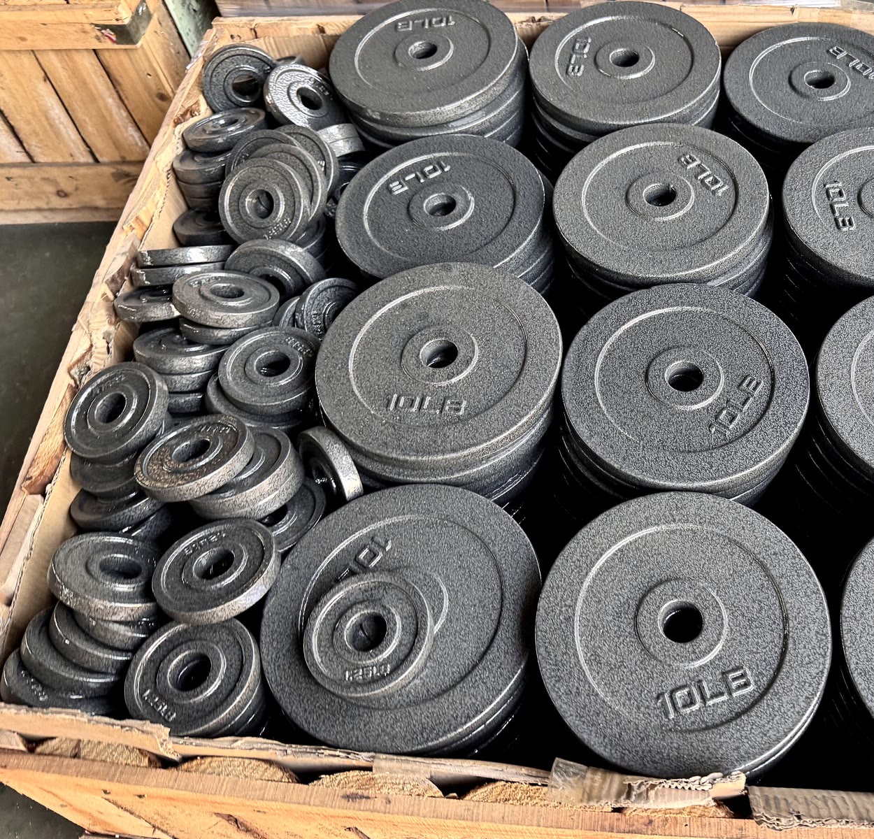 Plain weight plates organized in a regional production inventory